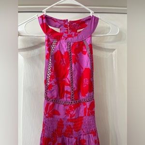 Floral red and fuchsia colored dress. Never been worn new with tags